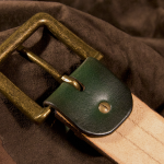 Leather belt with interchangeable buckle.